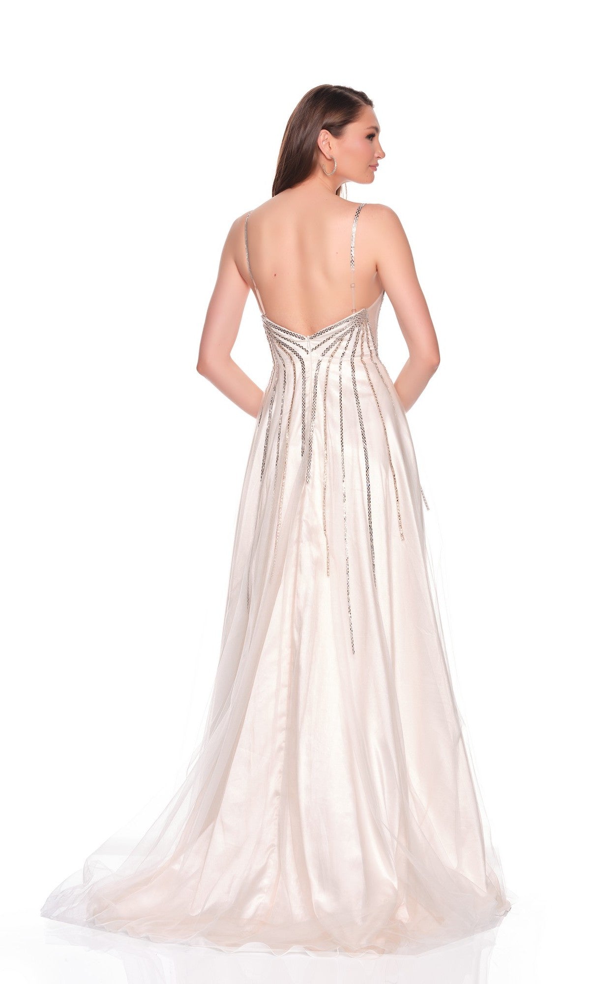 A woman stands against a white background wearing the Dave and Johnny 12842, a long white a-line prom dress featuring thin straps, a sleeveless design, and a beaded bodice.